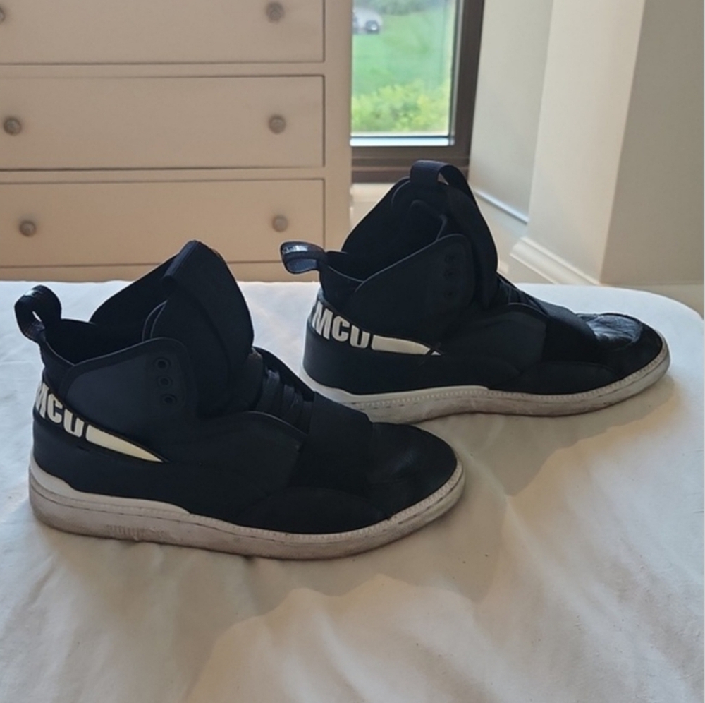 Alexander McQueen x Puma collar high tops sneakers.